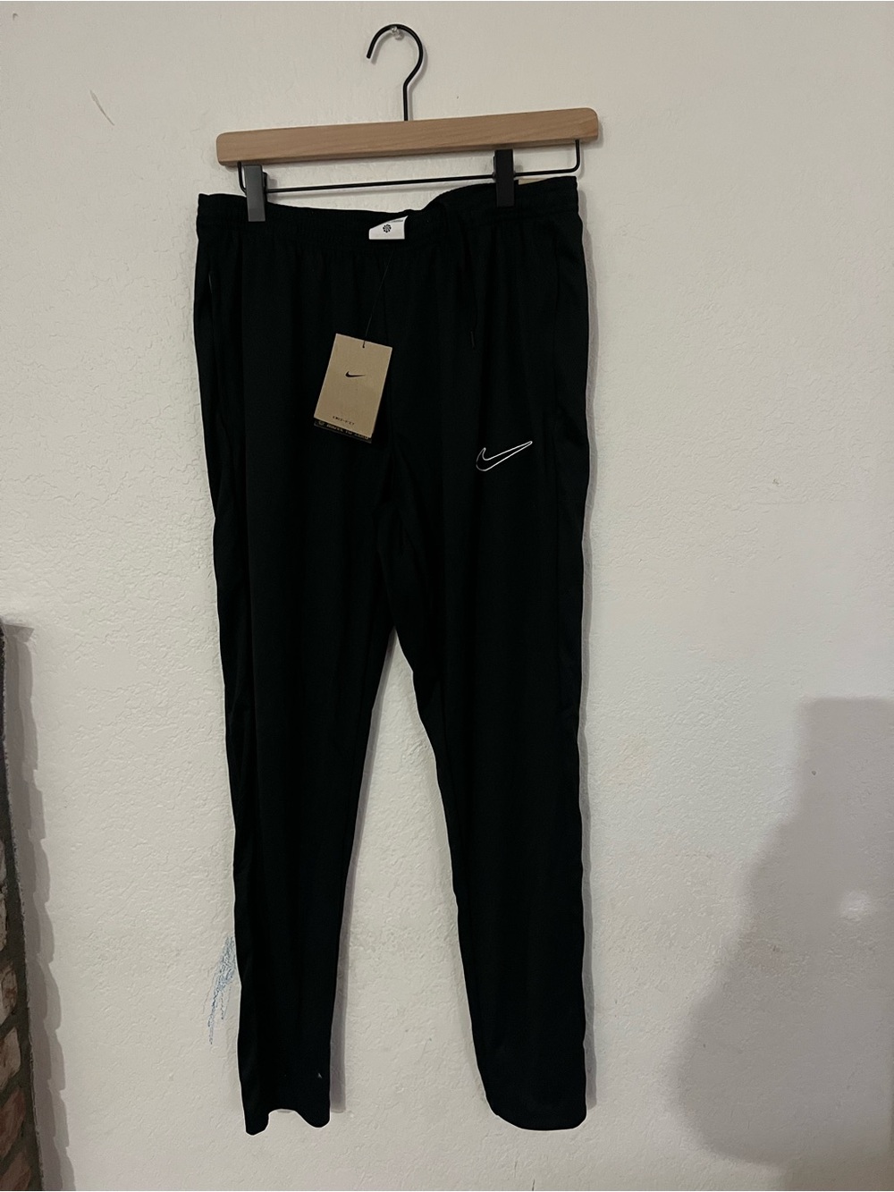 Nike Black Track Pants with White Swoosh